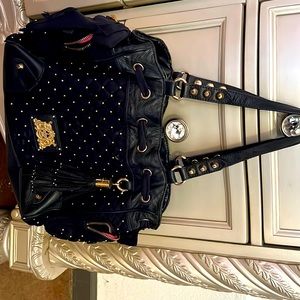 Used Blue Juicy Couture medium sized purse.